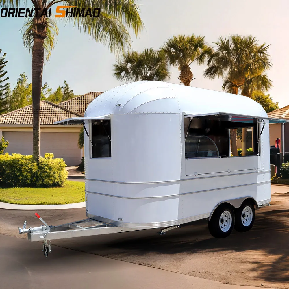 White Airstream тағам трейлері